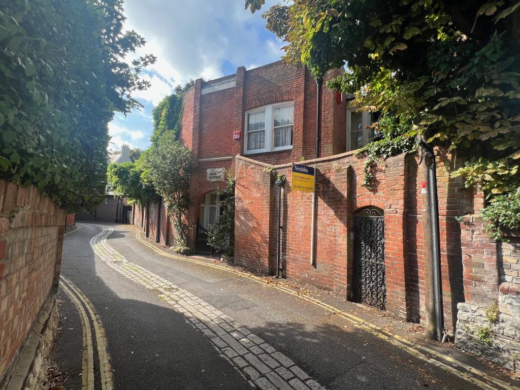Lot: 29 - DETACHED HOUSE WITH ROOF TERRACE AND GARDEN IN CENTRAL SOUTHSEA - Outside view of The Vale with walled garden and front porch